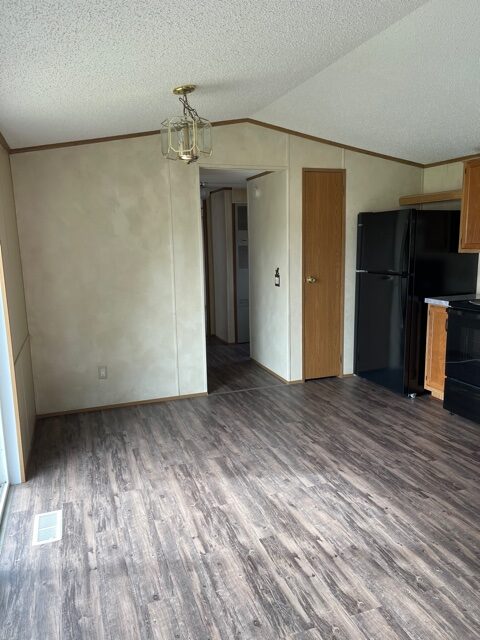 dining room and kitchen of available pre-owned home at 3325 Pierce Ave, #211