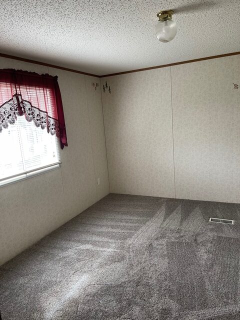 master bedroom with window of available pre-owned home at 3325 Pierce Ave, #211